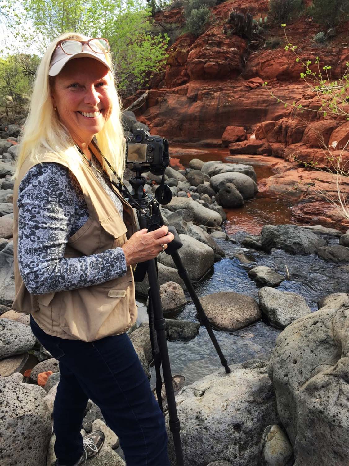 Grazina Wade with camera in stream