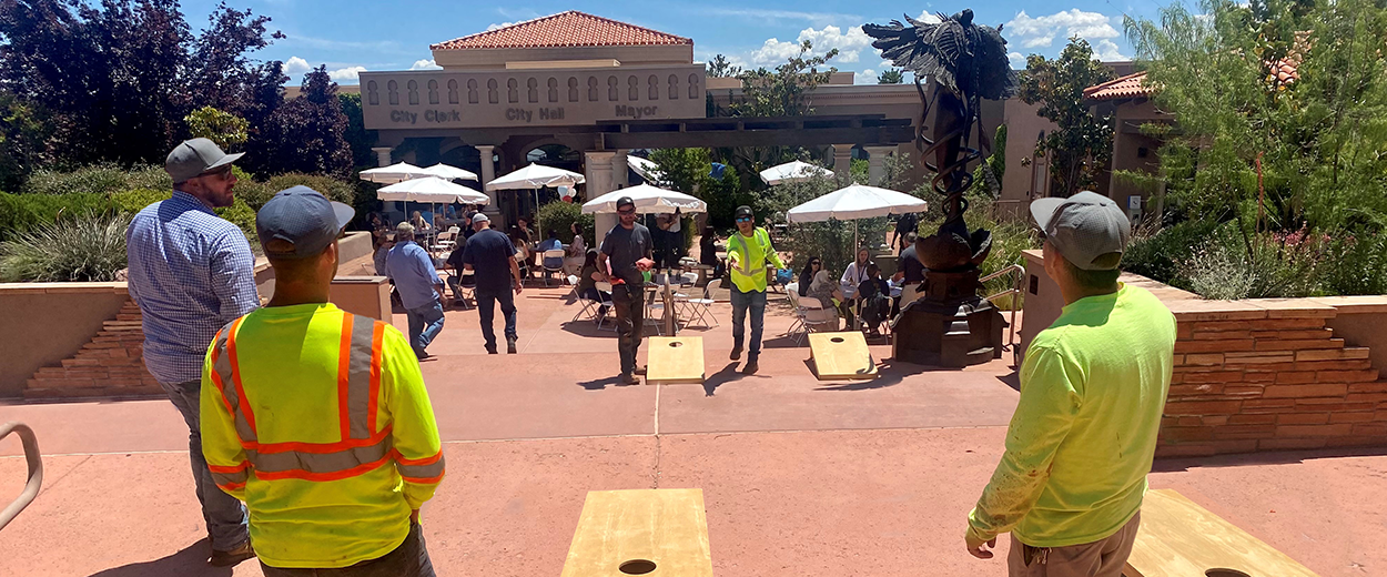 Employees of the city of Sedona play cornhole during the employee appreciation party