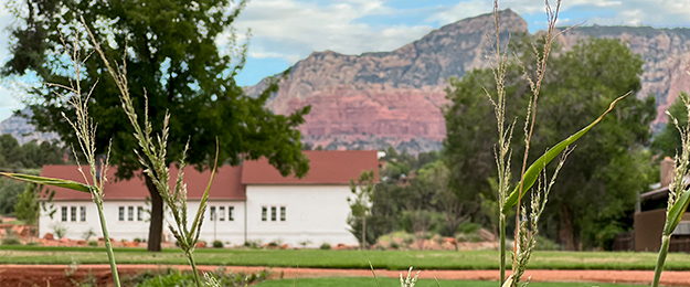 ranger station park barn lawn and red rocks